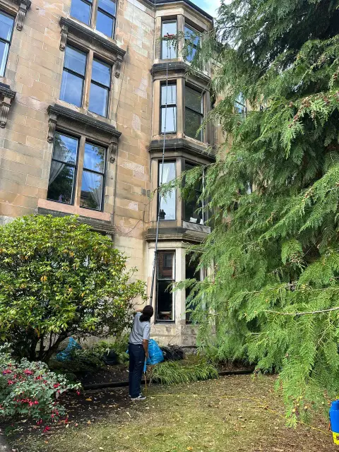 High reach window cleaning on a sandstone building in Glasgow